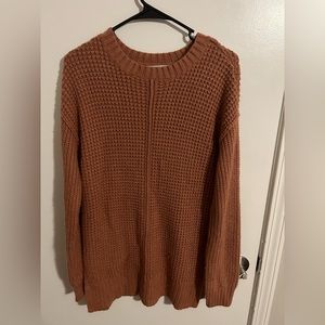 Size medium. Long sweater.